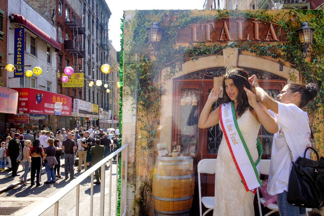 Lucy Spata, The San Gennaro Queen, from Brooklyn, gets her crown adjusted by her mother Giovanna prior to the procession.